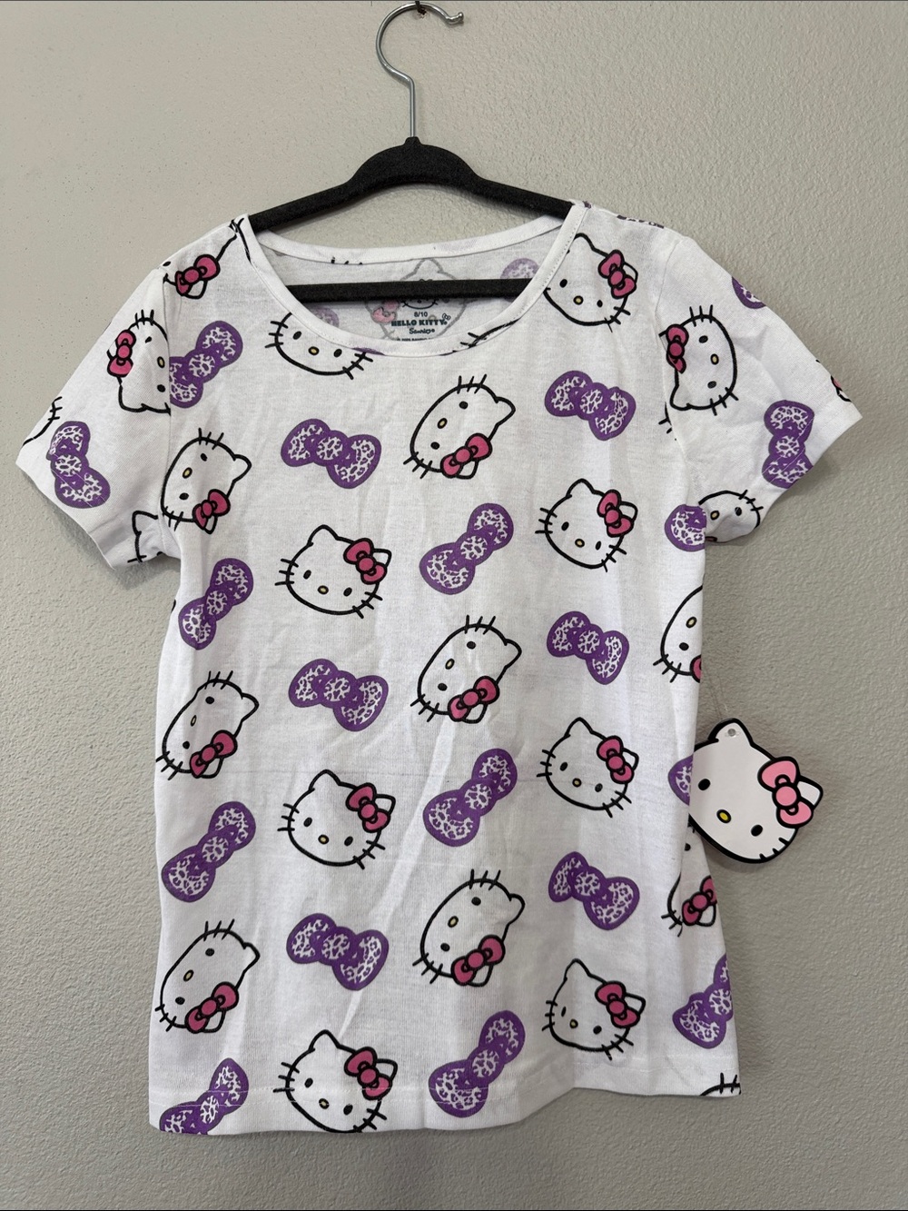 Hello Kitty White Tee with Pink & Purple Bow Pattern Girls 8/10
